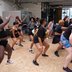 A group of people having a great time dancing, smiling and having fun whilst working out with JiggleFiTT