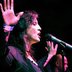 Gig at O2 Bubble image of middle aged white woman singing at mic