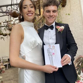 Beautiful bride and groom with illustration created at their wedding, by Zoe Parker Illustration