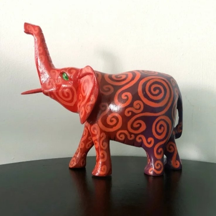 Wooden elephant ornament, red and purple with orange spiral decoration, handpainted and decorated, upcycled